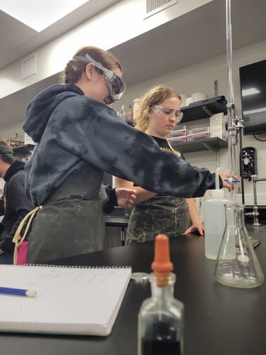 Students from the Advanced Chemistry class taught by Mr. De Vos practiced Acid/Base titration work