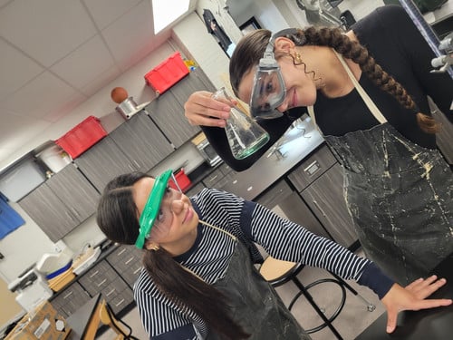 Students from the Advanced Chemistry class taught by Mr. De Vos practiced Acid/Base titration work