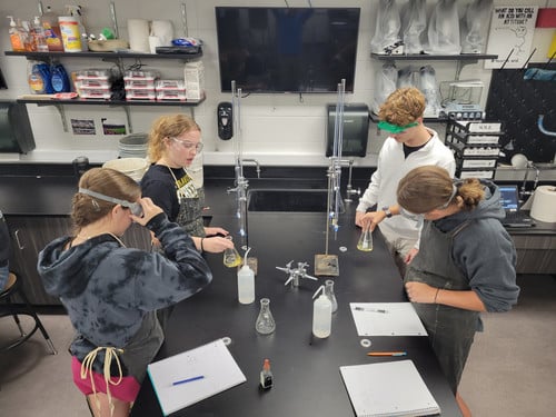 Students from the Advanced Chemistry class taught by Mr. De Vos practiced Acid/Base titration work