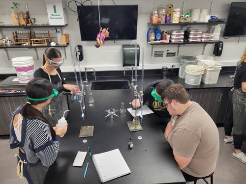 Students from the Advanced Chemistry class taught by Mr. De Vos practiced Acid/Base titration work