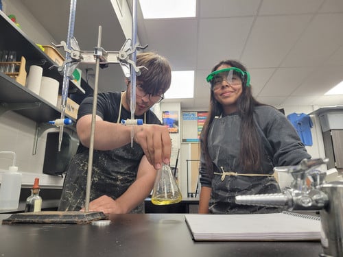 Students from the Advanced Chemistry class taught by Mr. De Vos practiced Acid/Base titration work